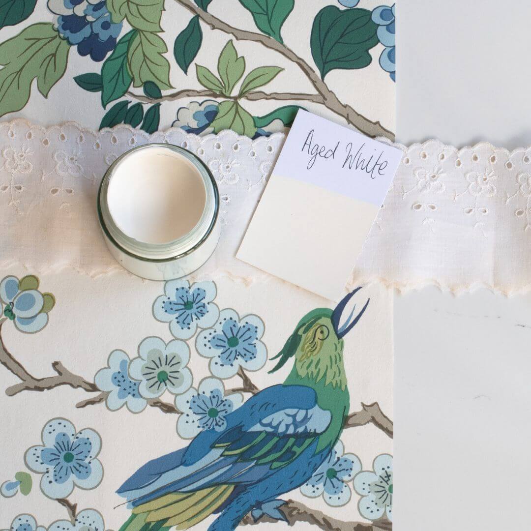 Mood board with blue and white fabric and 120ml pot of Aged White Blake & Taylor Chalk Furniture Paint