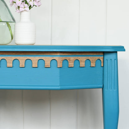 Close up of small vintage table painted with Blake & Taylor Marine Chalk Furniture Paint