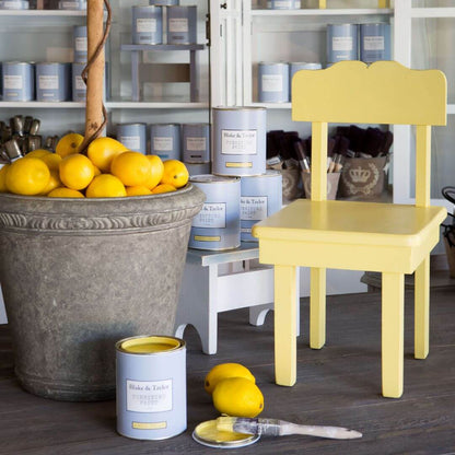 small vintage chair painted with  Blake & Taylor Simply Yellow Chalk Furniture Paint