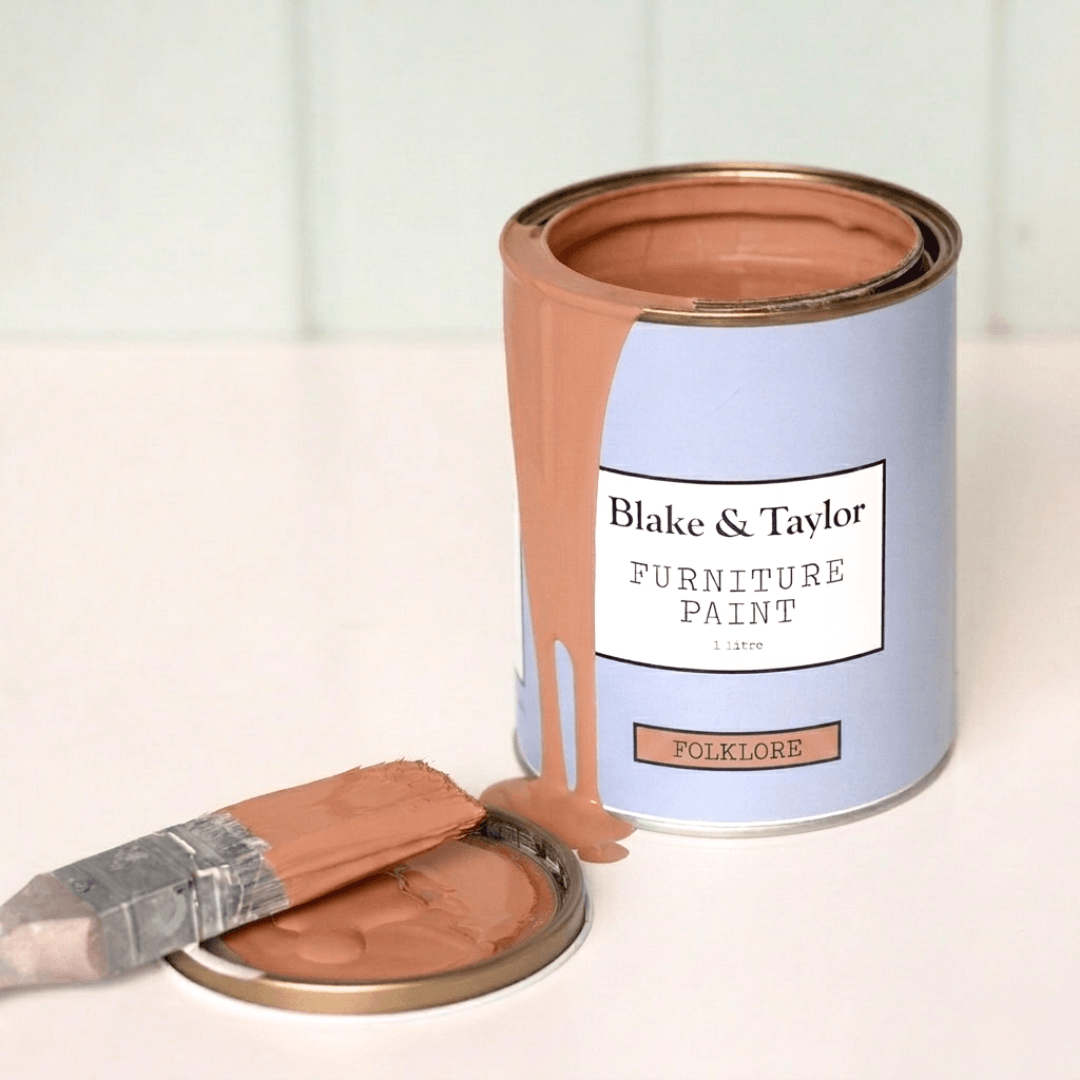 litre tin of Blake & taylor Paint with paint spill of colour folklore