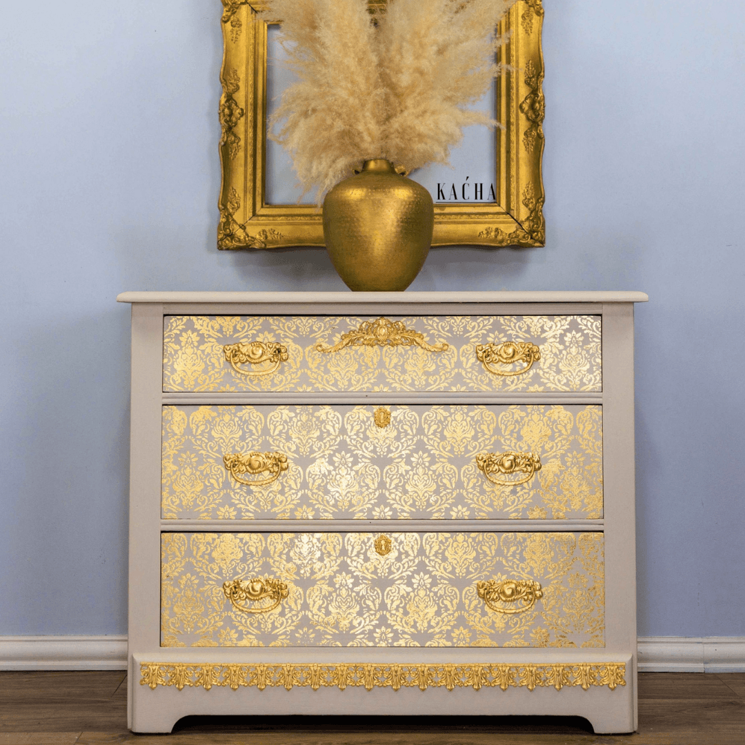 Set of drawers decorated with gold leaf pattern