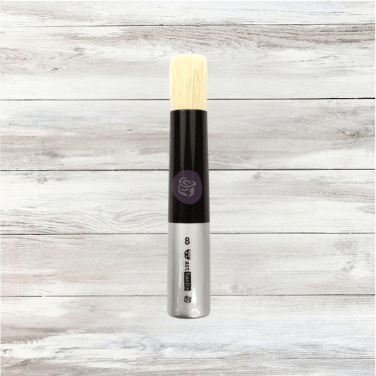 Medium dabbing brush by Re·design with Prima featuring a silver and black handle with natural white bristles, used for stencil application and blending.