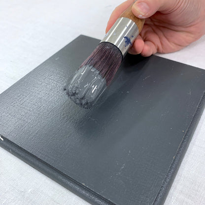 Paintbrush and Square timber swatch painted with Charcoal Blake & Taylor Chalk Furniture Paint