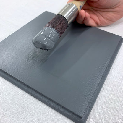 Paint brush and timber swatch painted with Blake & Taylor Steel Grey Chalk Furniture Paint