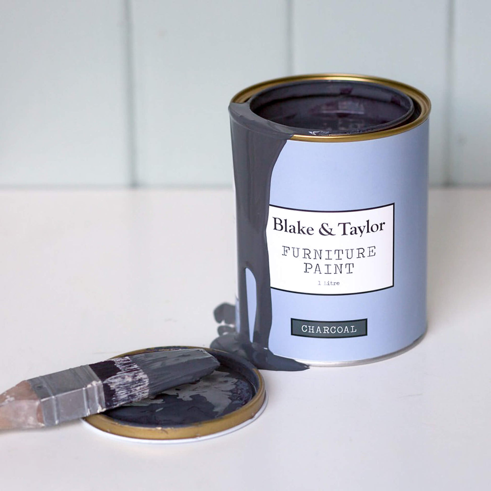 opened tin of 1 Litre Steel Grey Blake & Taylor Chalk Furniture Paint with brush